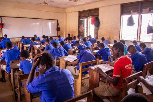 Candidates writing examinations